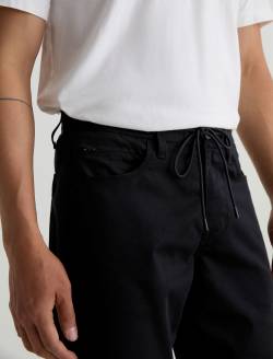 Men Reggie Commuter Performance Drawstring True Black at AG Jeans